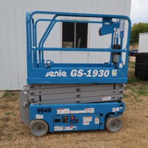 A scissors lift on the grass