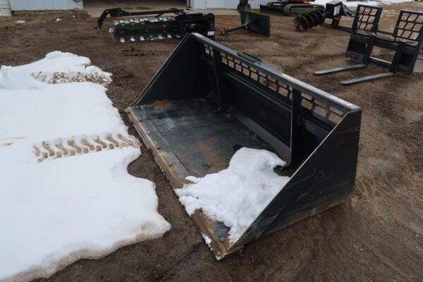 Skid Steer Snow Bucket on display